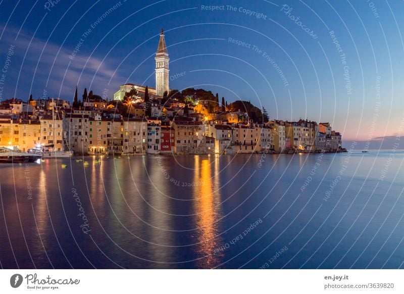 View of the port town Rovinj directly on the sea on the peninsula Istria in Croatia at the blue hour Europe Port City Evening Night Peninsula Old town