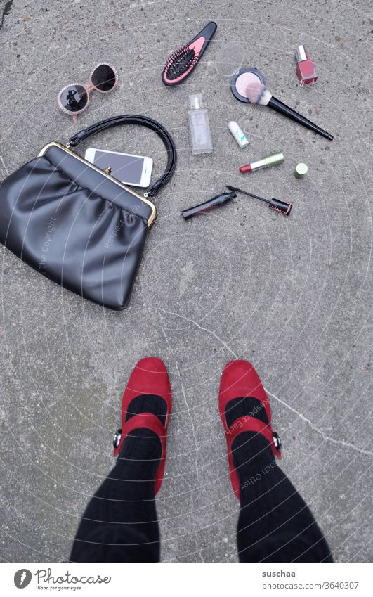 fallen down handbag of a lady with fallen out utensils Woman Lady feminine Feminine Legs High heels foot red shoes Asphalt Street Handbag Sunglasses Hairbrush