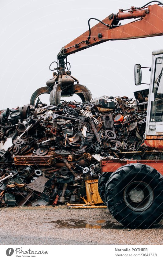 Machine with demolition grapple in recycling center machine metal recycle Colour photo Day Old Destruction Rust Exterior shot Broken Dirty Metal sorting