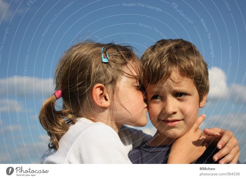 Little girl hugging boy in front of blue sky with white clouds Girl Boy (child) 2 Human being 3 - 8 years Child Infancy Touch Kissing Smiling Love Embrace