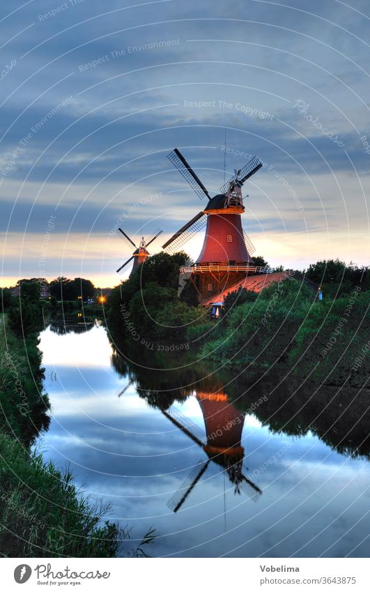 Twin mills in Greetsiel Windmill twin mills East Frisland crumhorns North Sea Lower Saxony Mill windmills Historic Architecture Evening bend Night at night