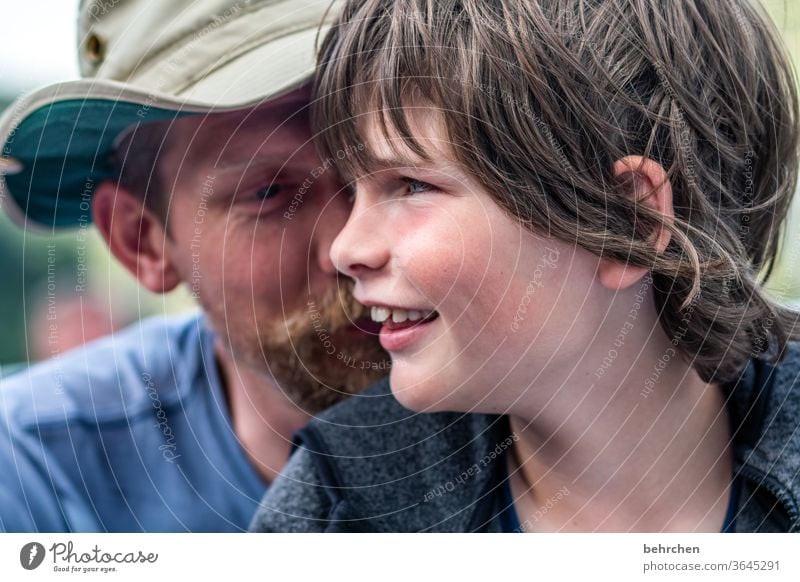 mysteries luck Facial hair Face Child Boy (child) portrait Light Detail Warm-heartedness Safety (feeling of) Trust Colour photo Day Son Love Together