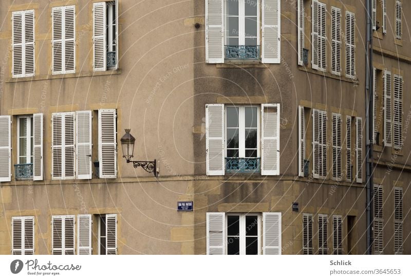 House facade Quai Paul Vautrin in Metz Lorraine houses Facades metz France Window folding shutter street sign streetlamp angles Corner