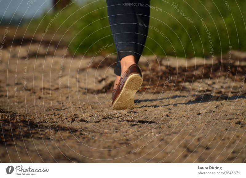 beach walk Walk on the beach Footwear foot Legs Beach Going Human being Woman feminine Exterior shot High heels To go for a walk stroll tranquillity Peace