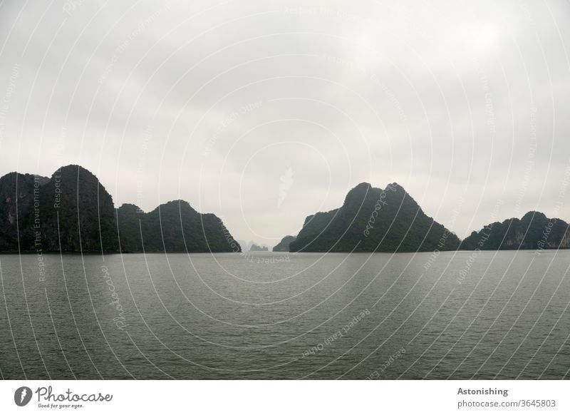 Hills in Halong Bay, Vietnam Halong bay Ha Long Ha Long bay layer distance wide Waves Ha-Long Asia Exterior shot Vacation & Travel Stone Rock Mountain Water