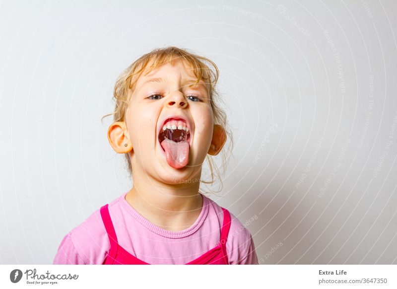 Portrait of funny and merry sweet little girl Adorable Beautiful Carefree Careless Caucasian Cheerful Child Childhood Crawling Crazy Cute Expression Face