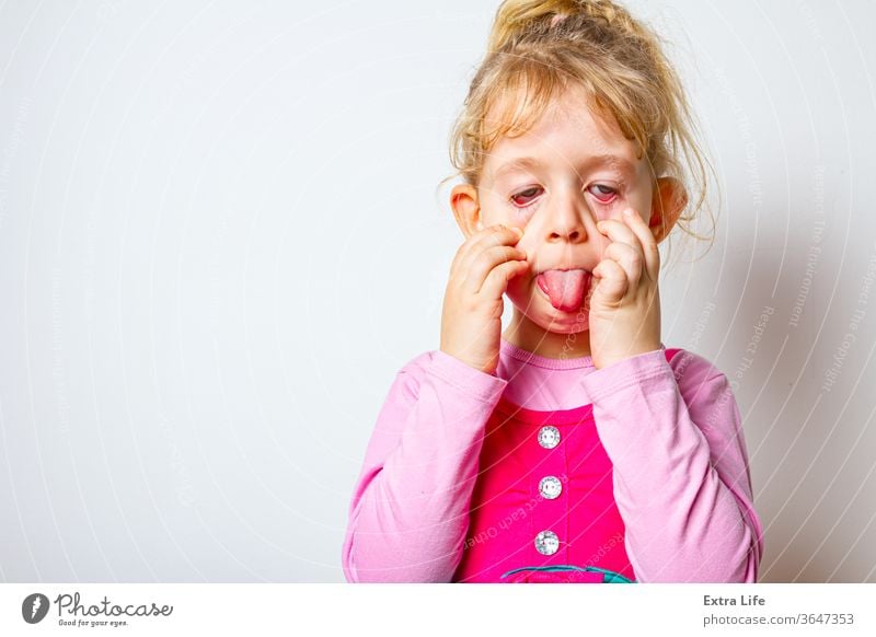 Portrait of funny and merry sweet little girl Adorable Beautiful Carefree Careless Caucasian Cheerful Child Childhood Crawling Crazy Cute Expression Face