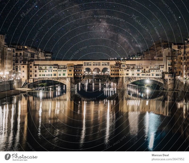 Ponte Vecchio bridge illuminated at night under the Milky Way. Florence ponte vecchio stars milky way astrophotography italy city architecture Renaissance