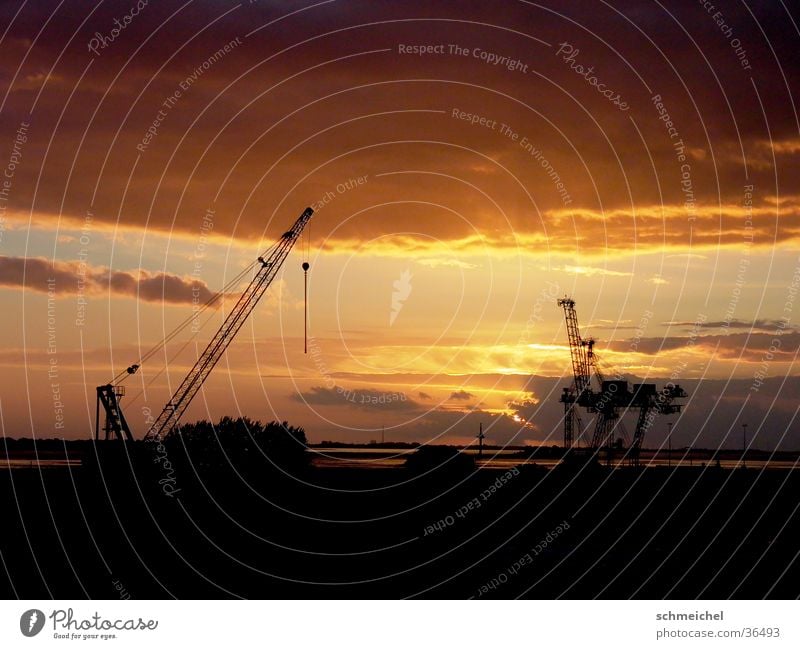 Harbour in the evening Clouds Crane Ocean Evening Bremerhaven Industry Dusk Far-off places Sky