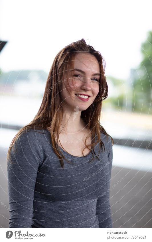 Portrait of a Pretty Woman Smiling Outdoors Smile female one person pose girl young woman looking at camera caucasian ethnicity close up medium close up