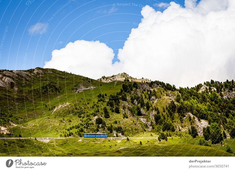 Mountain railway to Piz Nair in St. Moritz Sunbeam Day Light Exterior shot Alps Nature Nature reserve Effort Environment Hiking Beginning Brave Colour photo