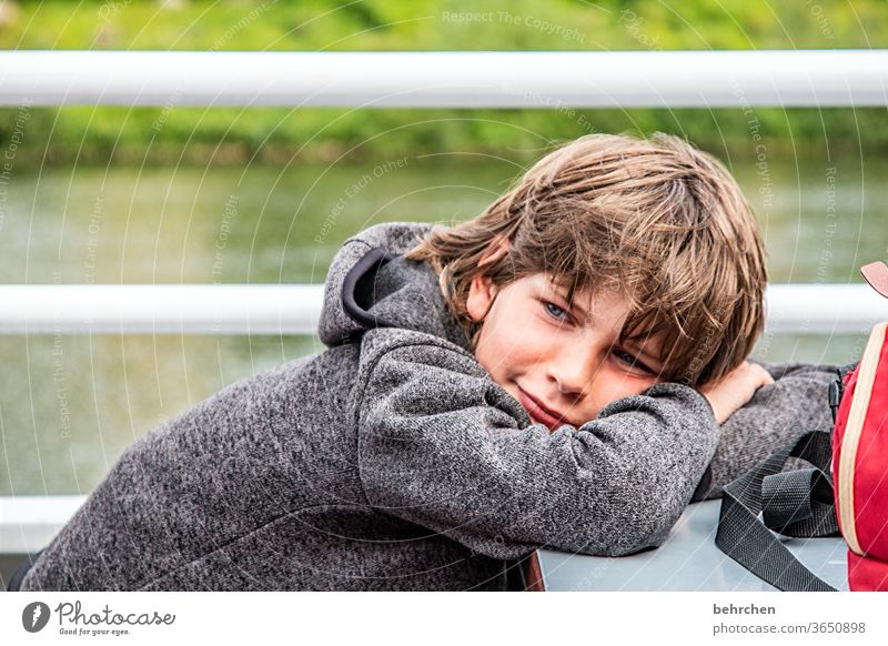 dreamer Dream Family & Relations Brash long hairs Colour photo Contrast Light Day Face Infancy Boy (child) portrait Close-up Child Sunlight Smiling allure