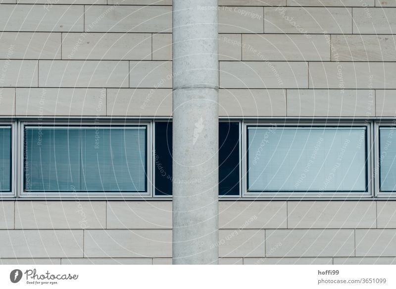 Column, windows and tiles on the wall minimalism Minimalistic columns Window pane reflective Architecture Modern dreariness Gray Facade Line Design Gloomy