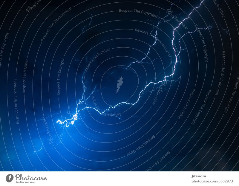 Lightning in the night sky Lightning bolt Exterior shot Storm Thunder and lightning Night Colour photo Sky Bad weather Storm clouds Weather Nature Environment