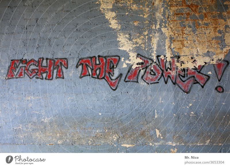 Fight against the power ! Graffiti Wall (building) Characters Facade built Gray lettering Characters and letters Dirty powerful Politics and state Abstract