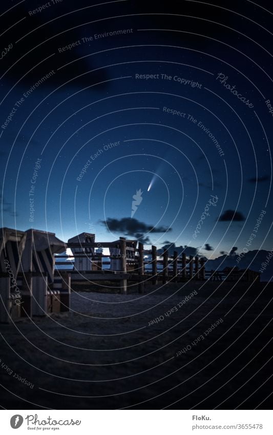 Comet Neowise over the beach chairs of St. Peter-Ording stars Beach Saint Peter Ording sanct peter-ording Night Astronomy Astrophotography neowise North Sea