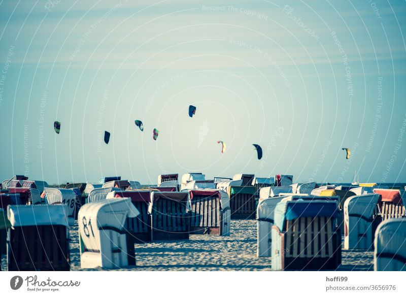 Kite kites with beach chairs - holiday by the sea kite kite Kite Sails Beach Nature Sun Beautiful weather Island North Sea Summer vacation Blue Coast Sand