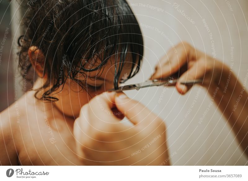 Mother cutting daughter's hair motherhood Daughter Hair and hairstyles Haircut Hairdresser Style Hairdressing Interior shot Caucasian Child childhood