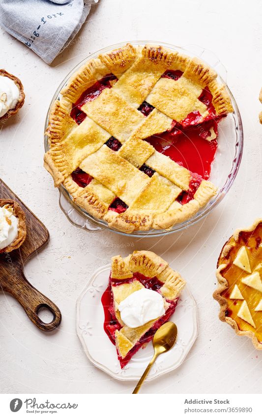 Top view shot of variety of thanksgiving pies food pecan apple pumpkin season autumn baking dinner seasonal round traditional closeup fresh cuisine table