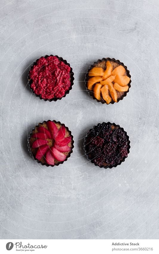 Fruit cakes on table fruit pie berry assorted various delicious bakery ripe palatable fresh food raspberry blackberry dessert sweet organic arrangement tasty