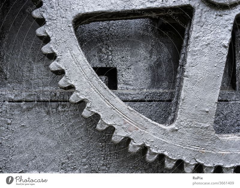 Gear wheel on a historical machine. Gear unit Gearwheel gearing gearbox Mechanics technique Machinery pinion spur gear dovetail cogwheel gearwheel clockwork