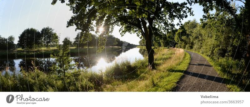 Canal near Bad Bederkesa Channel stockpile channel bederkesa bad bederkesa geestland Lower Saxony Landscape River Brook off Sun Back-light tree Northern Germany