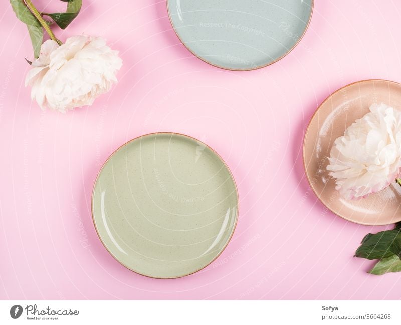 Pastel color dishes on pink tableware crockery pastel ceramic flower background dinnerware dishware design kitchenware set food summer spring plate party cup