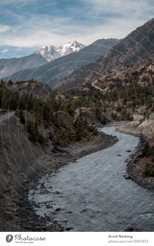 Marshyangdi river valley by Upper Pisang village and surrounding mountains adventure anapurna trail annapurna annapurna circuit asia background beautiful blue