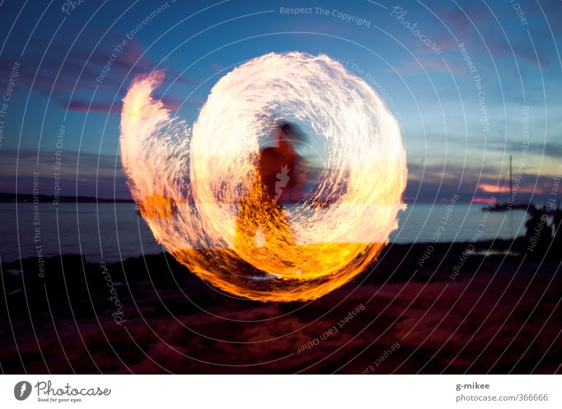 fireball Fire Water Sky Summer Beach Movement Illuminate Dance Yellow Disciplined Energy Art Precision Moody Colour photo Exterior shot Copy Space bottom