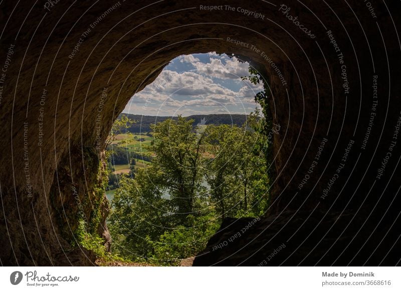 View from a cave at the Happurg reservoir mountains Cave rocky Summer Hiking Nature Mountain Landscape Rock Tourism Vacation & Travel Exterior shot Trip