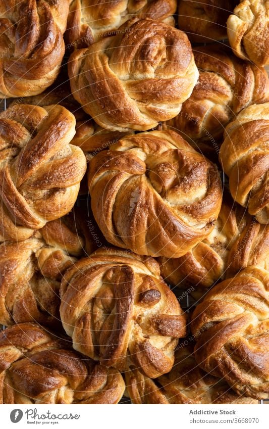 Pile of sweet cinnamon buns roll bakery background pile delicious baked heap food tasty fresh dessert pastry tradition ingredient yummy organic gourmet cuisine