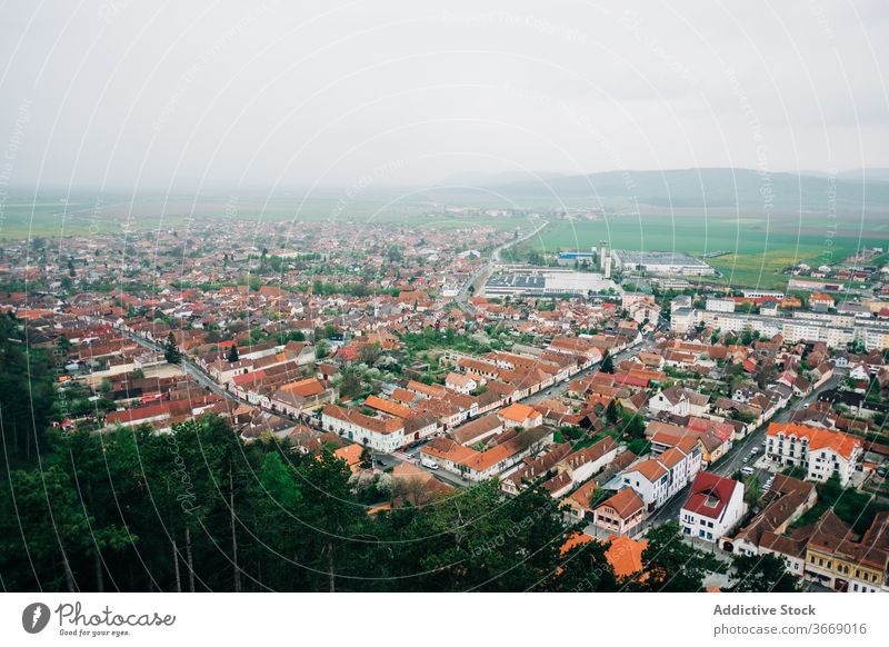 Picturesque view of Saint George city architecture cottage green cozy landscape travel picturesque saint george scenery romania transylvania scenic destination