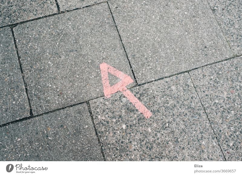 Red arrow pointing left up on asphalt Arrow Direction Asphalt Above Left Orientation Turn off make a turn to the left Forwards Navigation Road marking