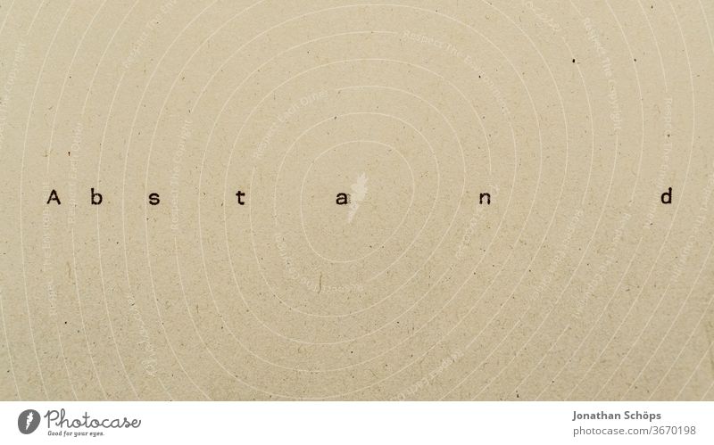 Spacing as text on paper with typewriter gap Distance rule Decency corona corona crisis coronavirus covid-19 Protection against infection Paper Recycling