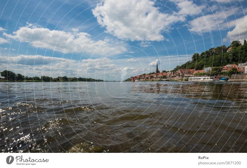 On the banks of the Elbe in Lauenburg. Elbe march River stream Body of water Current Landscape Waves Weather spring sunshine Evening evening mood Dam Dike