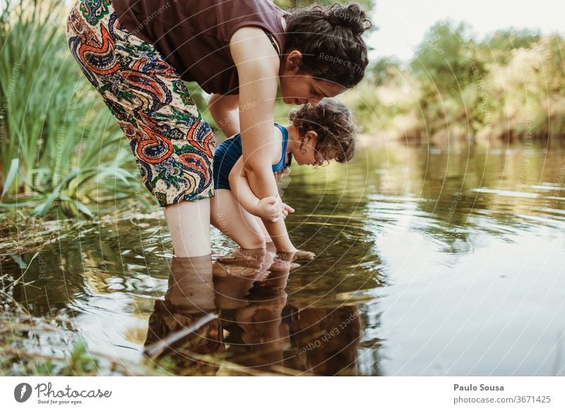 Mother and Daughter playing in the river Summer Summer vacation Together togetherness motherhood Family & Relations family Happiness Cute people Parents Child