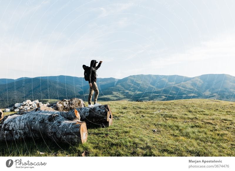 Young man exploring the great outdoors adventure alone backpack backpacker beautiful climber day discovery environment explorer free freedom high hike hiker