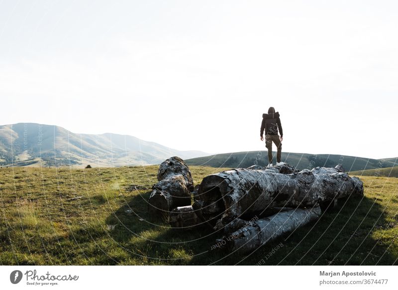 Young man exploring the great outdoors adventure alone backpack backpacker beautiful climber day discovery environment explorer free freedom high hike hiker