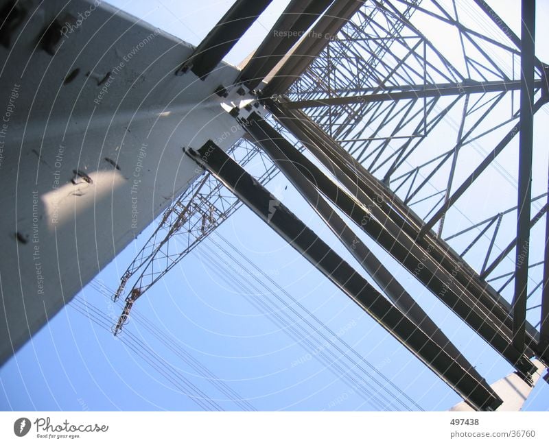 high High-power current Electricity pylon Industry Blue sky from bottom to top