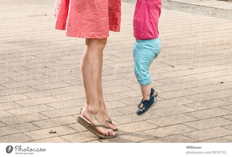 Mother and child hopping Legs Child Woman Baby Toddler Summer Hop Jump at the same time Cheerful sunny warm Dress Joy Infancy Family & Relations Happiness luck