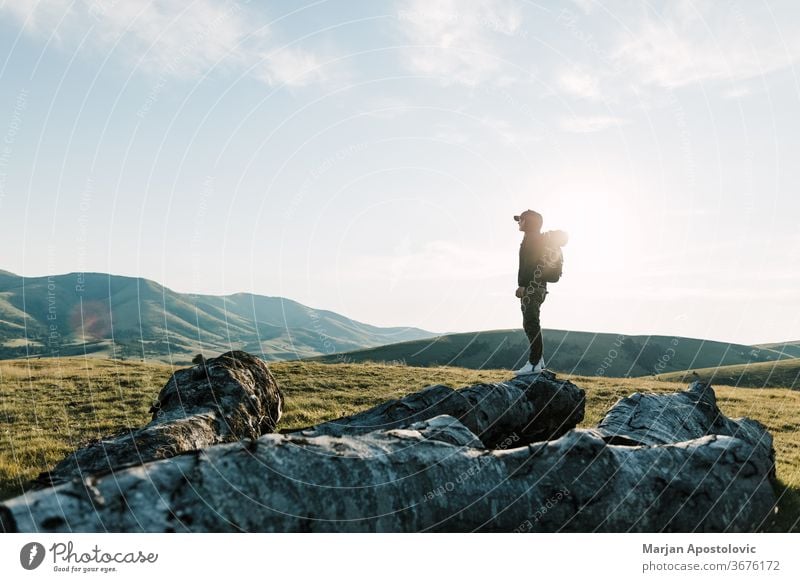 Young man exploring the great outdoors adventure alone backpack backpacker beautiful climber day discovery environment explorer free freedom high hike hiker