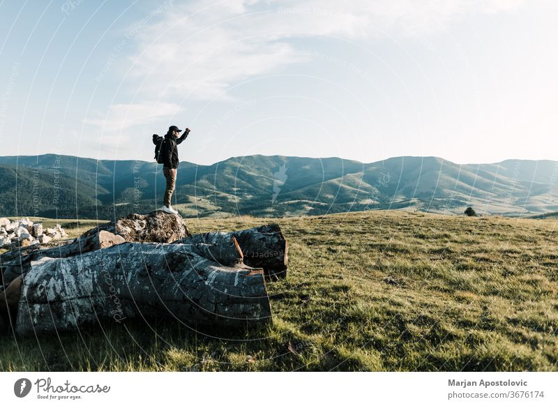 Young man exploring the great outdoors adventure alone backpack backpacker beautiful climber day discovery environment explorer free freedom high hike hiker