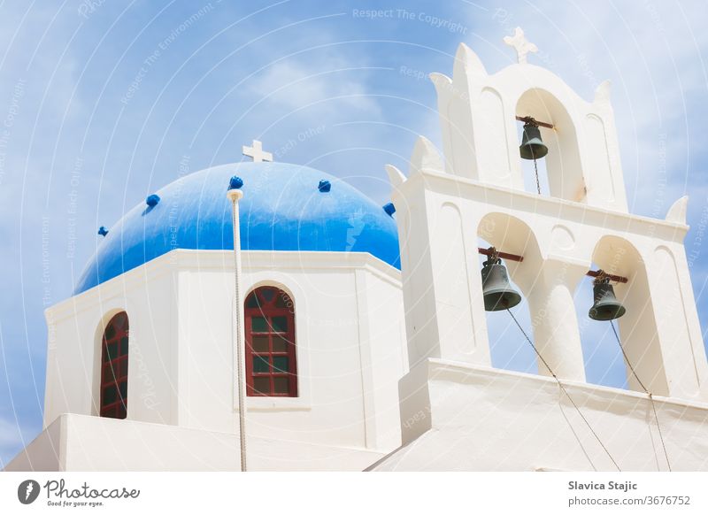 Famous beautiful Orthodox church with blue dome in Oia on Santorini island, Greece aegean architecture building caldera coast culture cyclades day destination