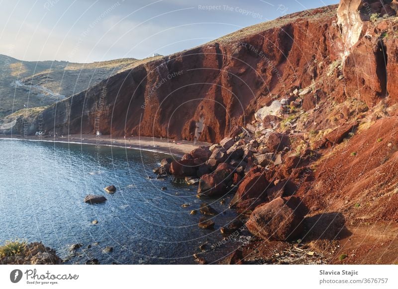 Famous Red Beach, with volcanic sand  and  rocky shoreline on Santorini island ,  Akrotiri, South Aegean, Greece aegean akrotiri background bay beach blue cliff