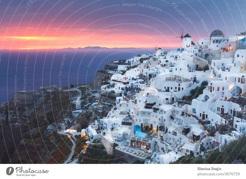 Landscape of beautiful world famous  village of Oia, just after sunset, Santorini, Greece aegean blue building city cityscape cyclades destination dusk europe