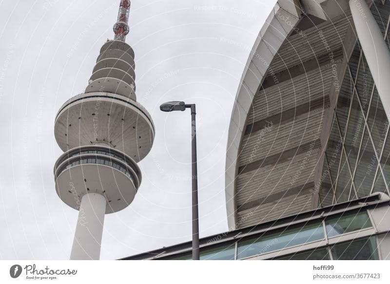 Lamp, tower and hall in triad Architecture Street lighting Television tower Telecommunications tower Downtown streetlamp Lantern Landmark Manmade structures Sky