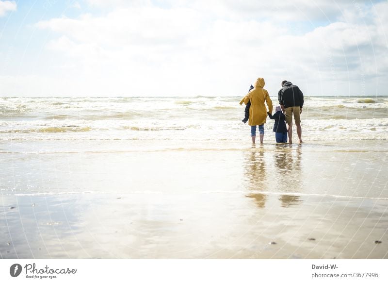 Family on holiday by the sea ocean Family outing Family time Parents children Mother Father Child Together in common vacation Joy Enthusiasm