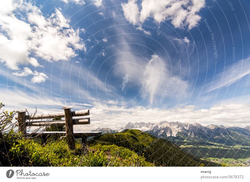 Wooden bench with view to the Hochwurzen, the Dachstein massif and down to Schladming Ennstaler Alps Bench Landscape Nature Hiking Mountain Freedom