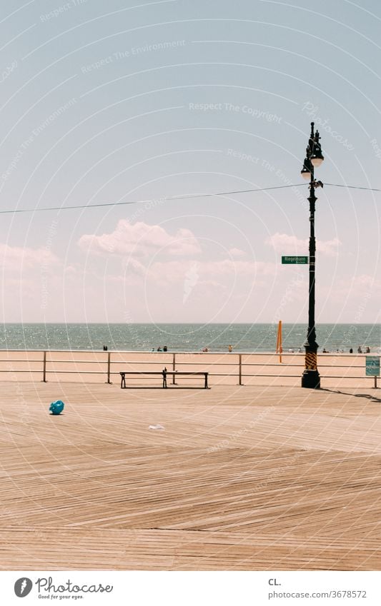 seafront promenade beach promenade Beach Water Ocean Lantern Lanes & trails Beautiful weather Sky Blue sky vacation Vacation & Travel Bench Relaxation Summer