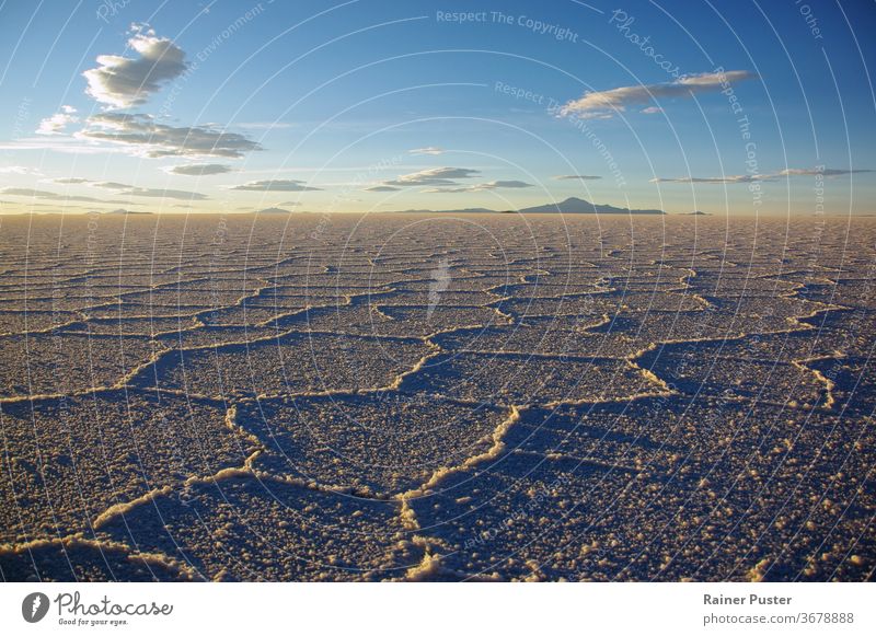 Gorgeous patterns on the surface of the salt flats of Salar de Uyuni, Bolivia, during sunset bolivia desert empty floor gorgeous horizon landscape nature